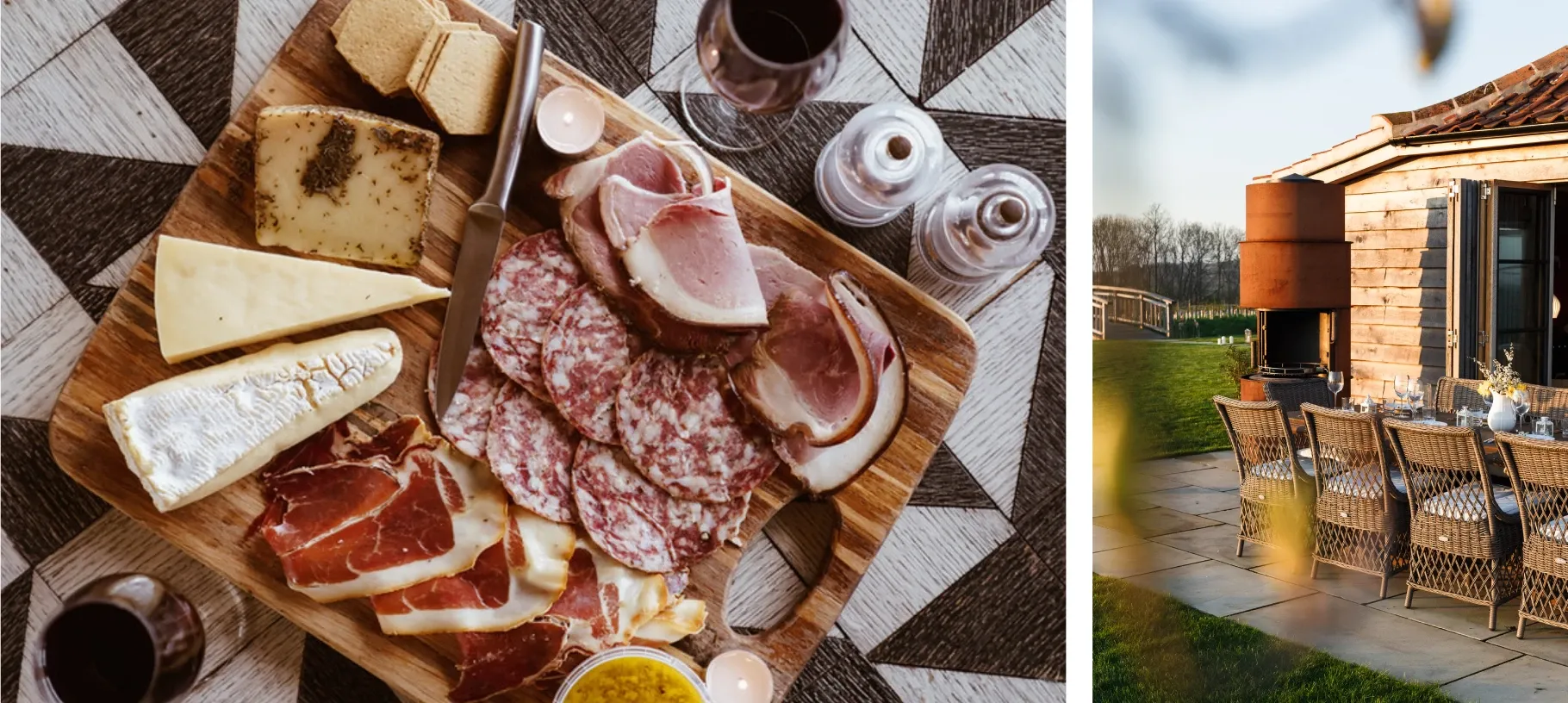 A cheese and charcuterie board with red wine, beside a property’s terrace laid for dinner in the evening sun